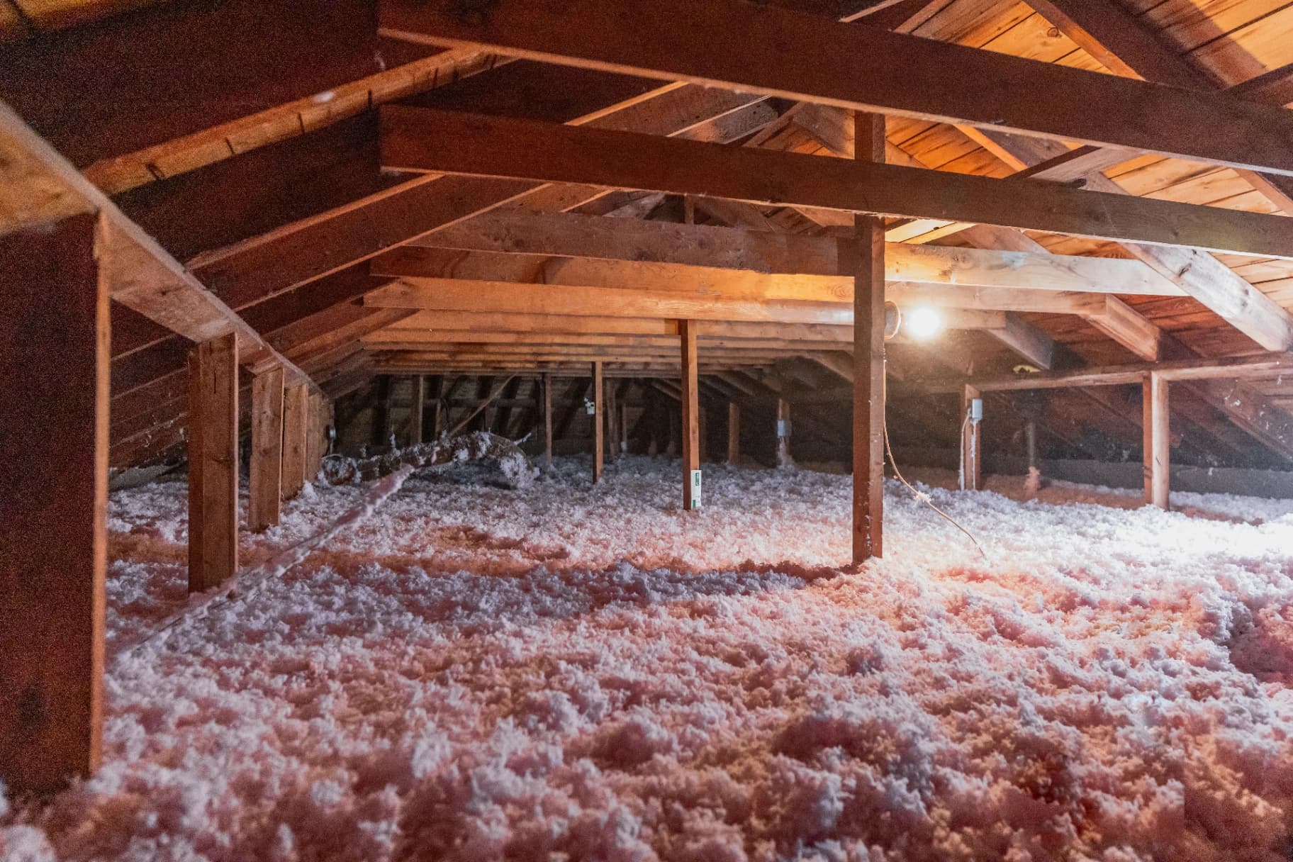 Attic after insulation: even, code-compliant coverage